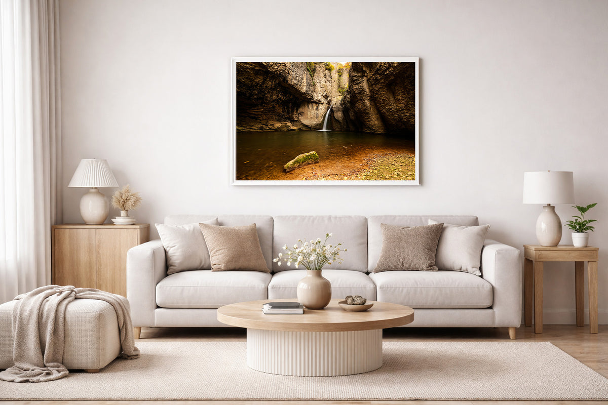 Emen Waterfall landscape photograph displayed on an interior wall